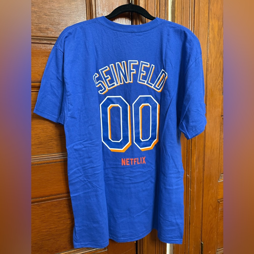 Mets NWT Seinfeld Blue Graphic T-Shirt with Orange Accents size L